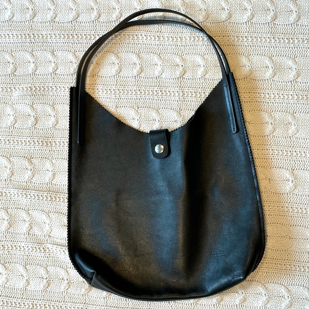 Jack Gomme black leather tote bag